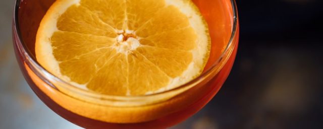 Orange slice in a cocktail at our boutique hotel near Tampa Airport