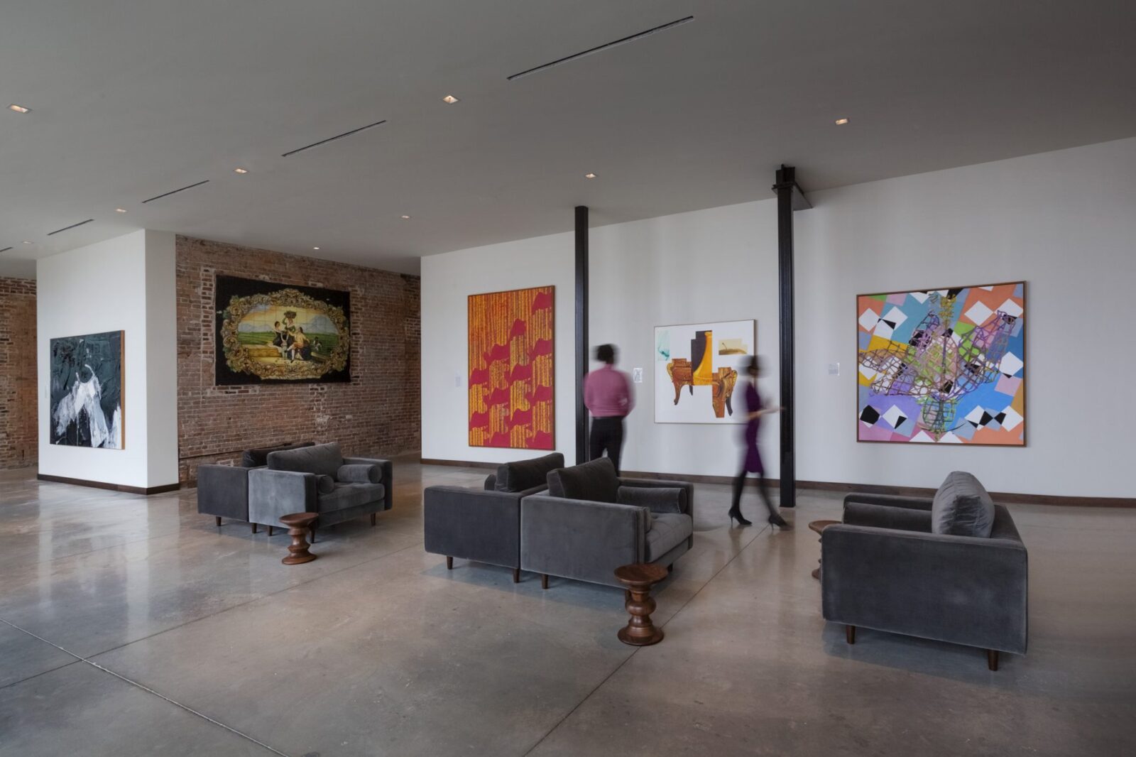 Various artworks and lounge chairs at our Ybor City, Tampa hotel