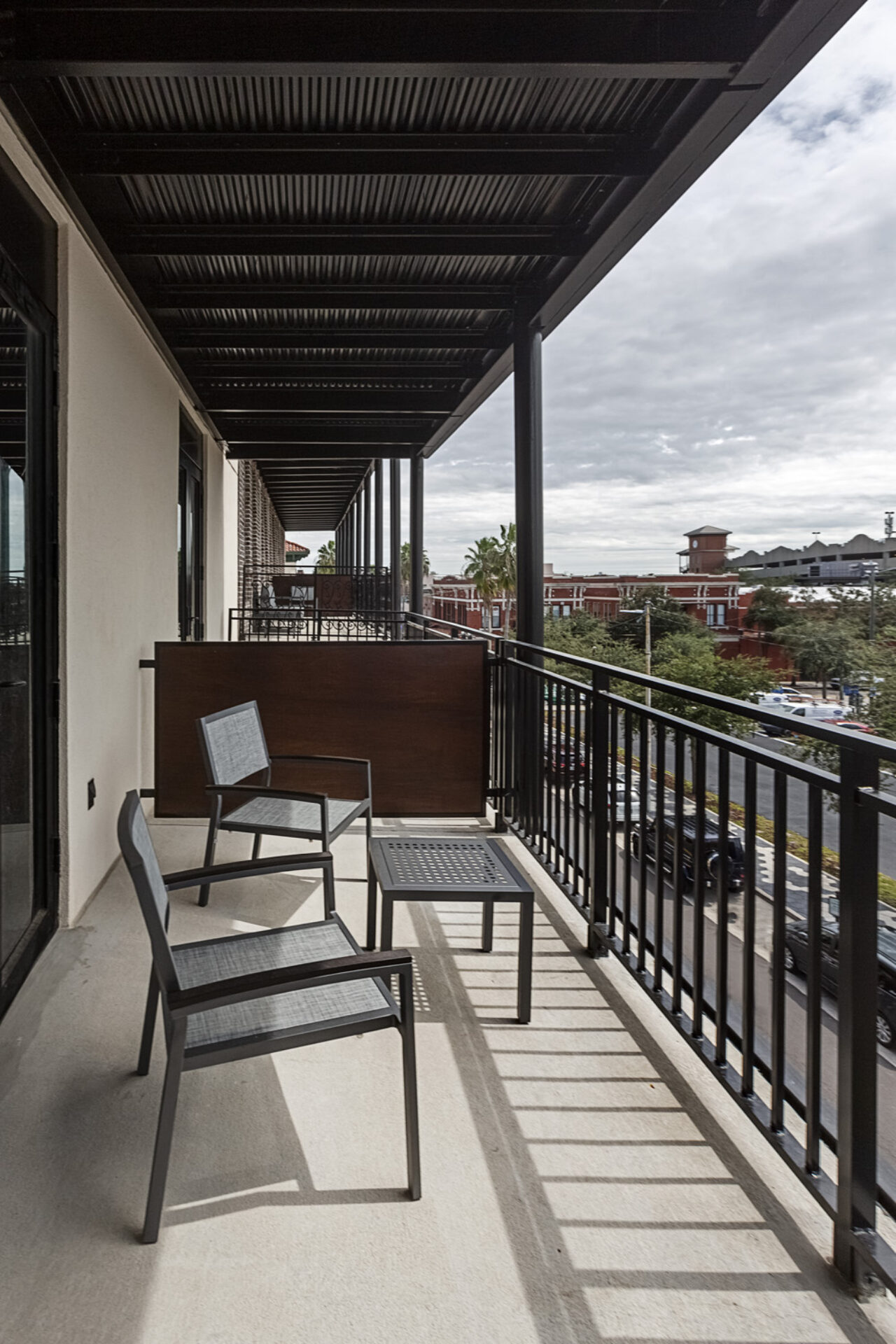 Seating on a large balcony over the street at our hotel in Ybor City, FL