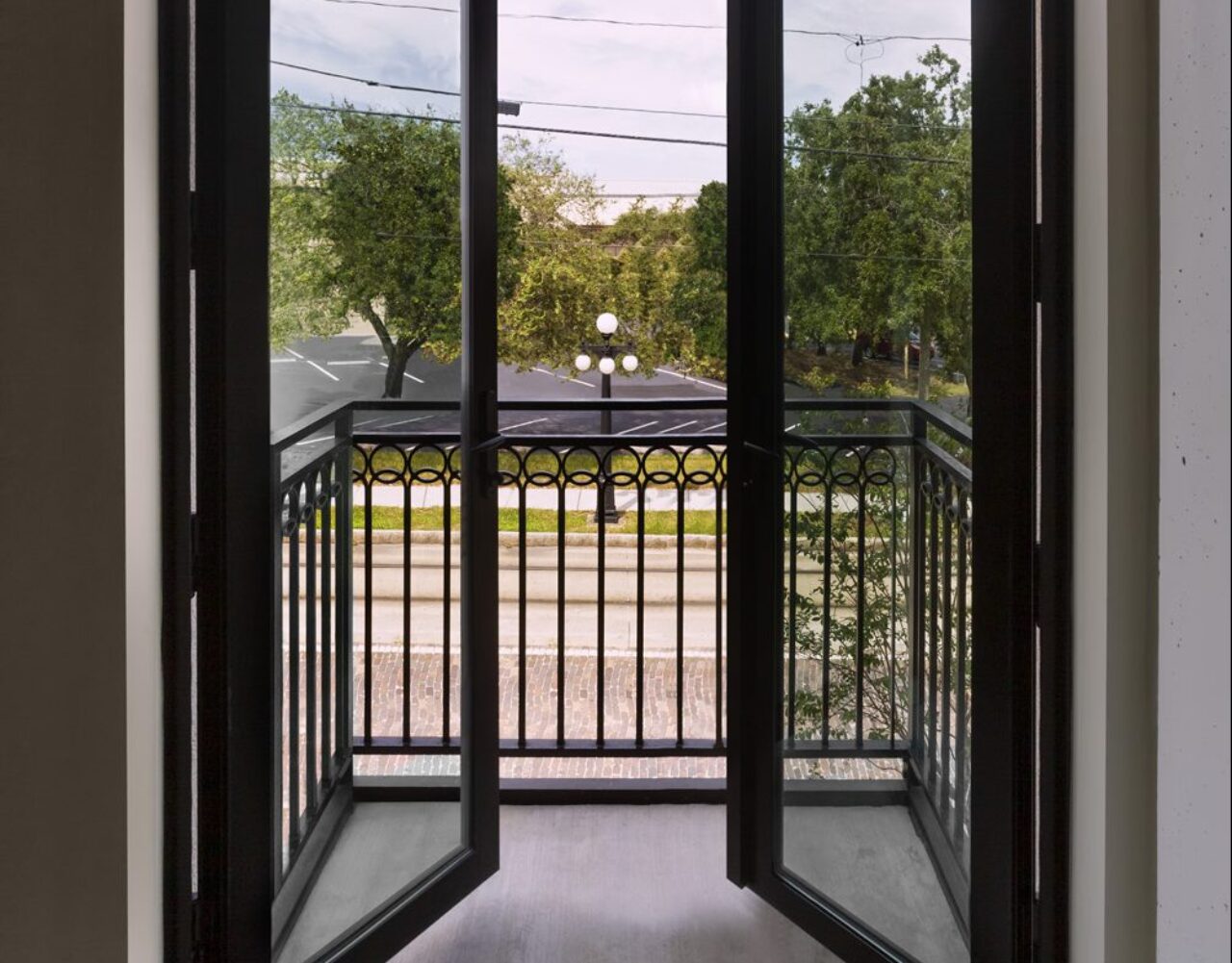 Balcony at our boutique hotel in Tampa, Florida overlooking the street