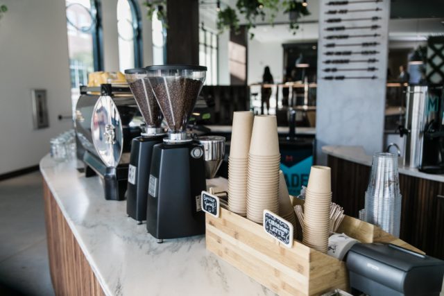 Containers of coffee beans on a counter at our Tampa hotel