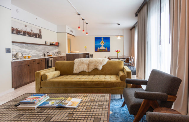 Seating and kitchen area in a suite at our hotel in Ybor City, Tampa