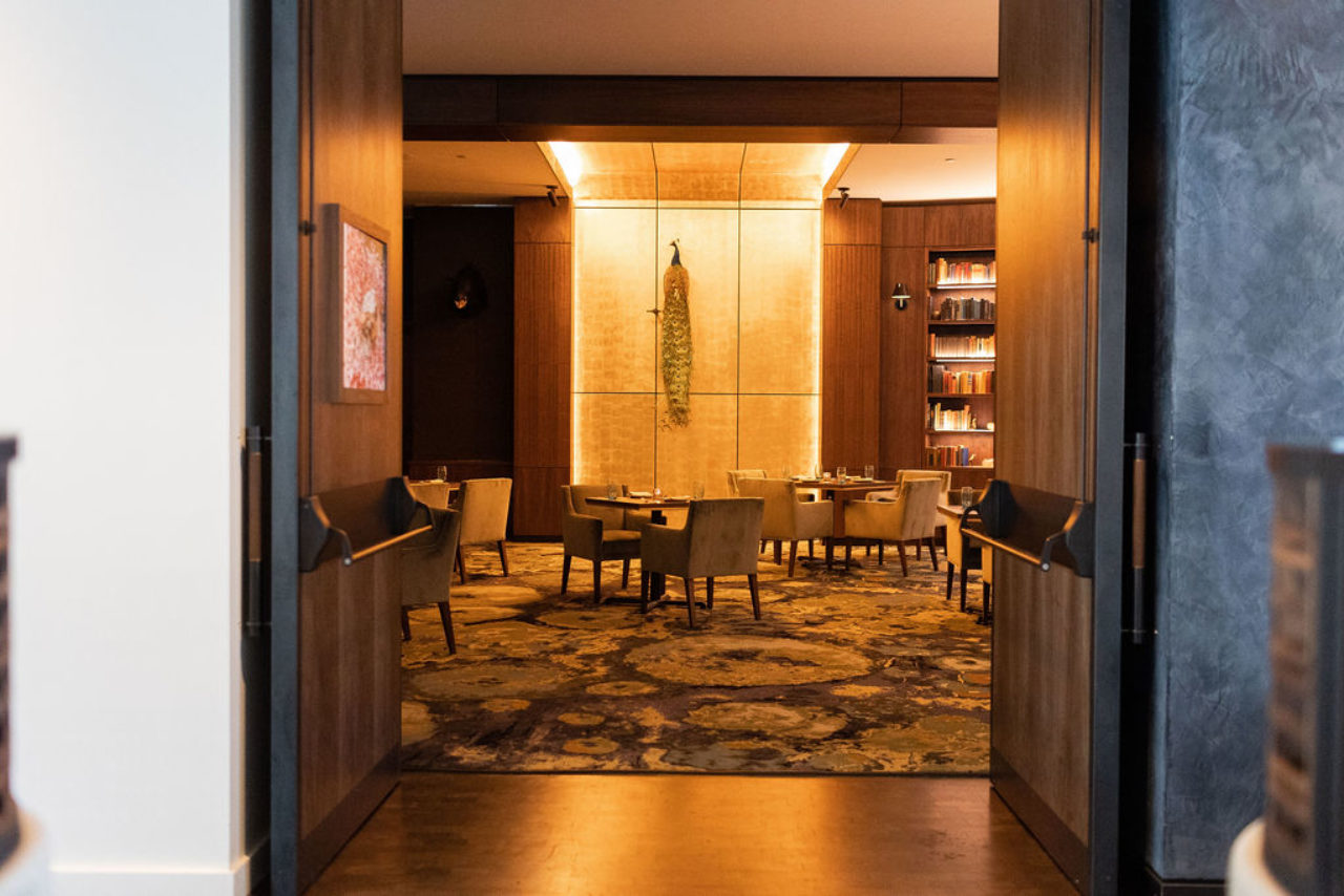 Warm lighting over dining tables at our hotel in Ybor City, Tampa